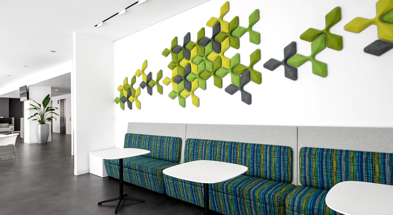 green and grey acoustic tiles above seating area