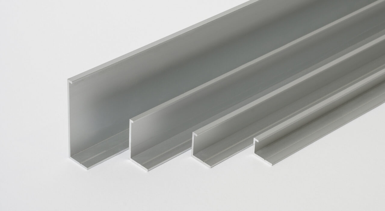 four aluminum edging profiles staggered from largest to smallest