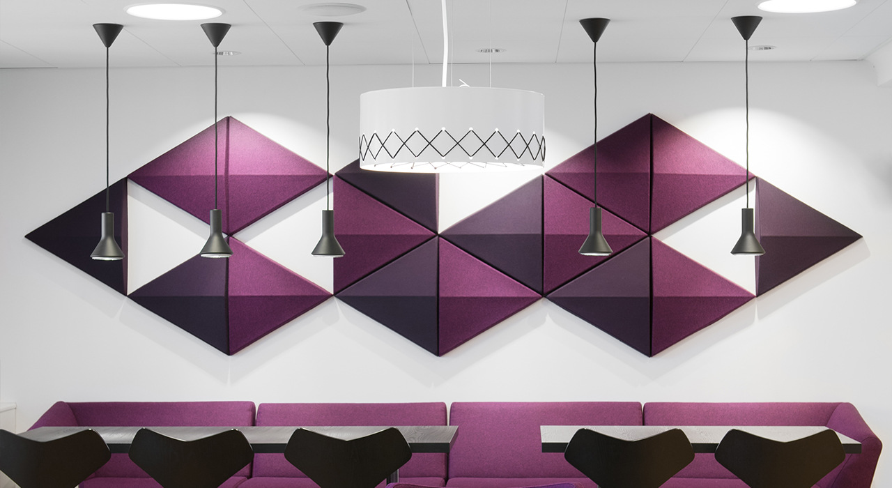 triangle shaped purple acoustic tiles on wall