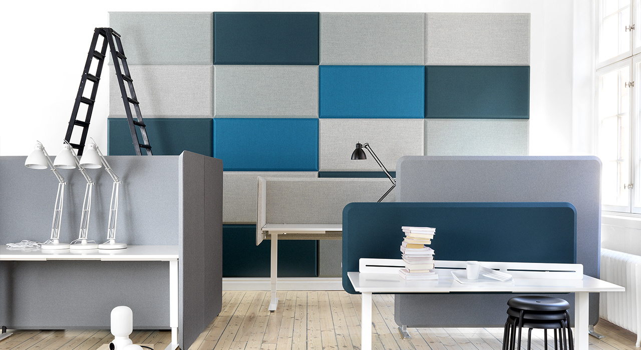Installation featuring acoustic tile Domo Wall blue grey office work space desk chair table sound absorbing wool