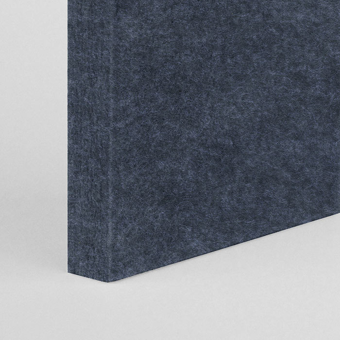 corner of a dark blue acoustic panel