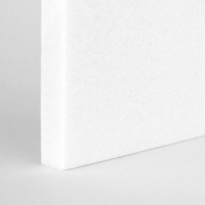 corner of a white acoustic panel