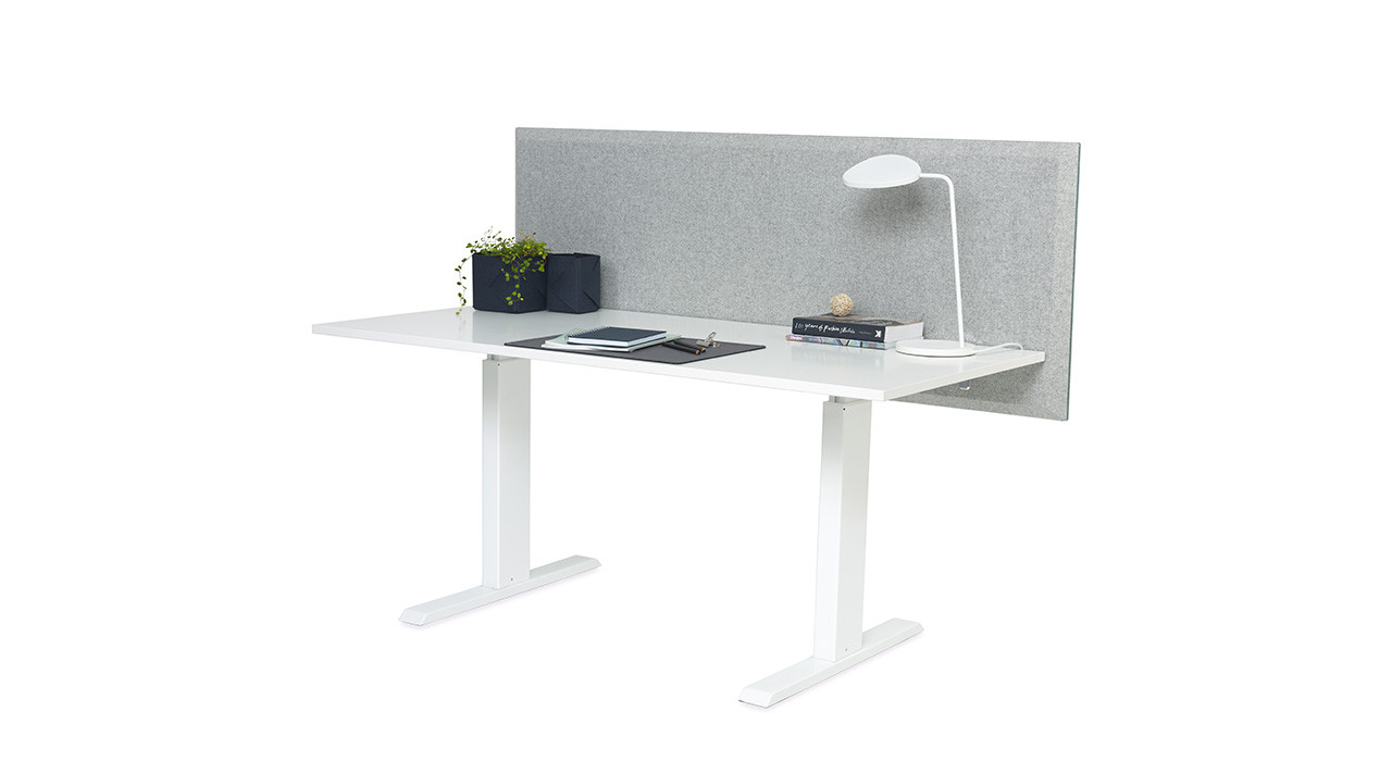 grey acoustic table screen straight edges on desk with lamp and books