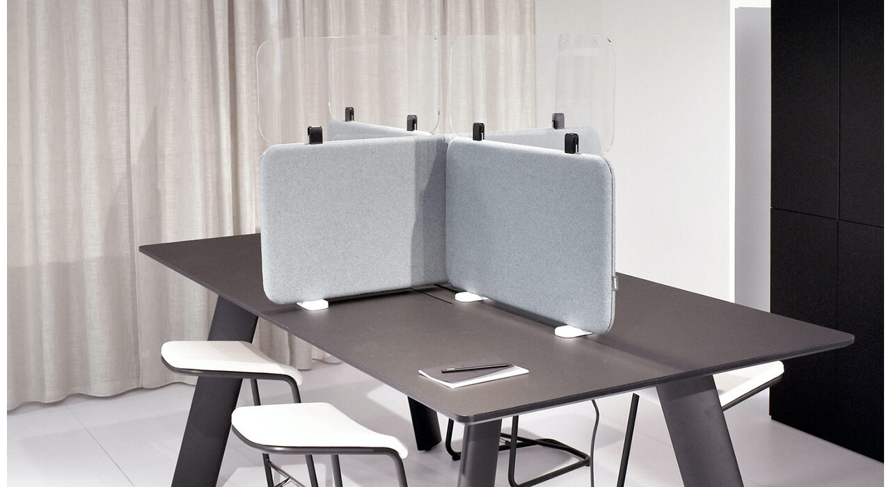 four way grey mobile desk screens with acrylic tops on dark table