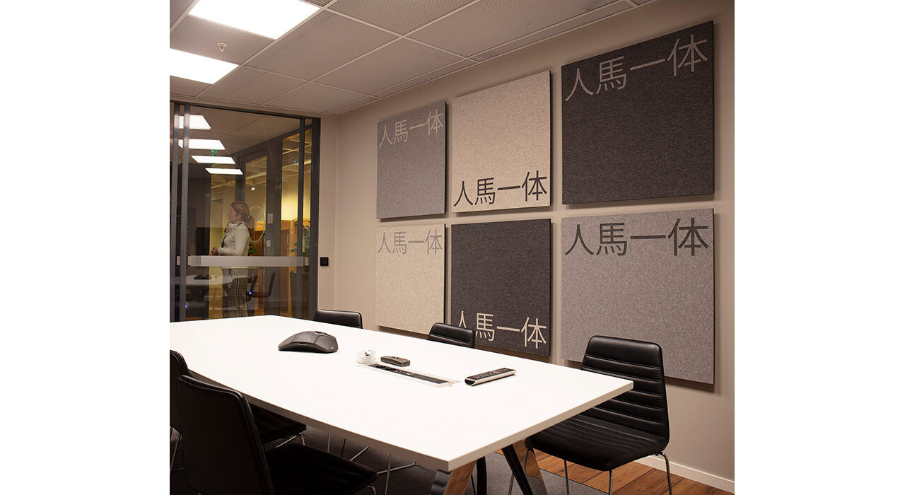 sound absorbing acoustic wall tiles using tan and charcoal wool felt