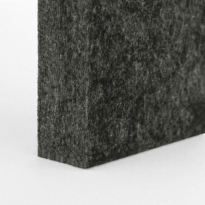 detail of a textured dark grey acoustic panel