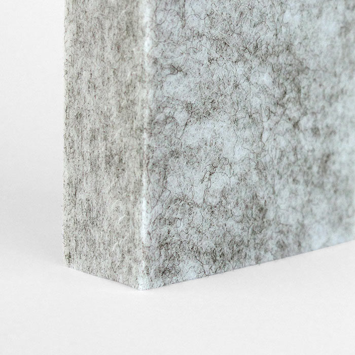 detail of a textured light grey acoustic panel