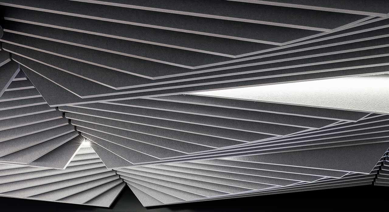 detail of light grey sound-absorbing ceiling tile