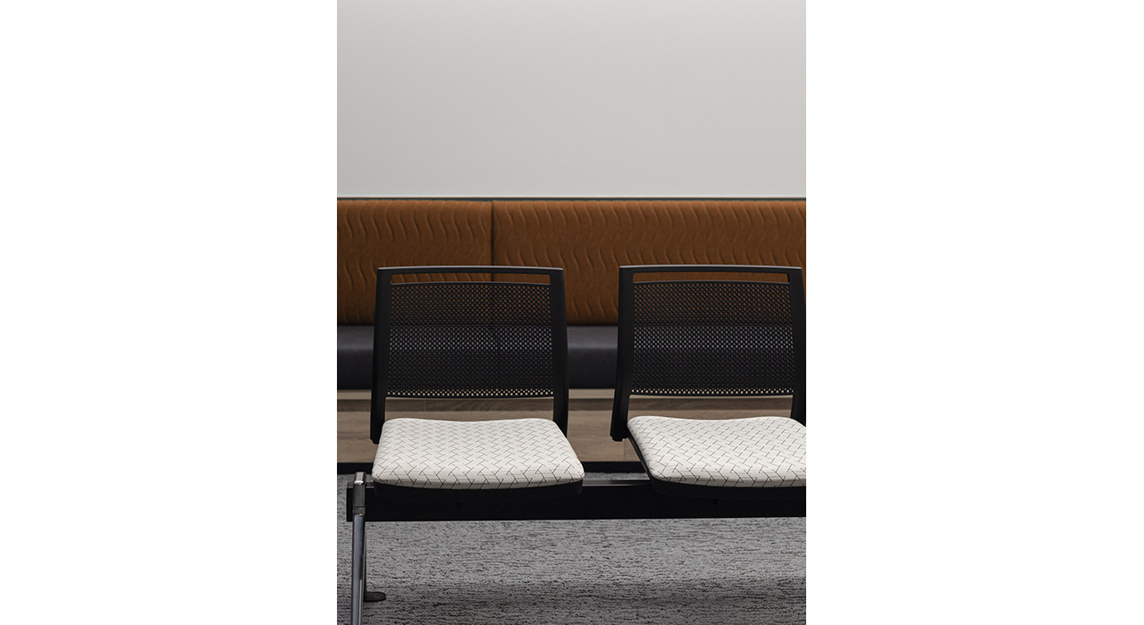 white with black design fabric on lobby seats