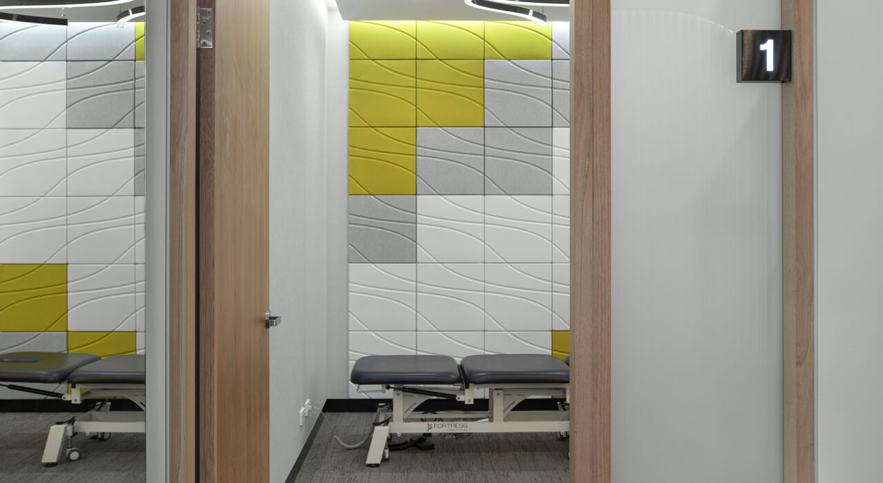 colorful arrangement of sound-absorbing wall tiles in exam rooms