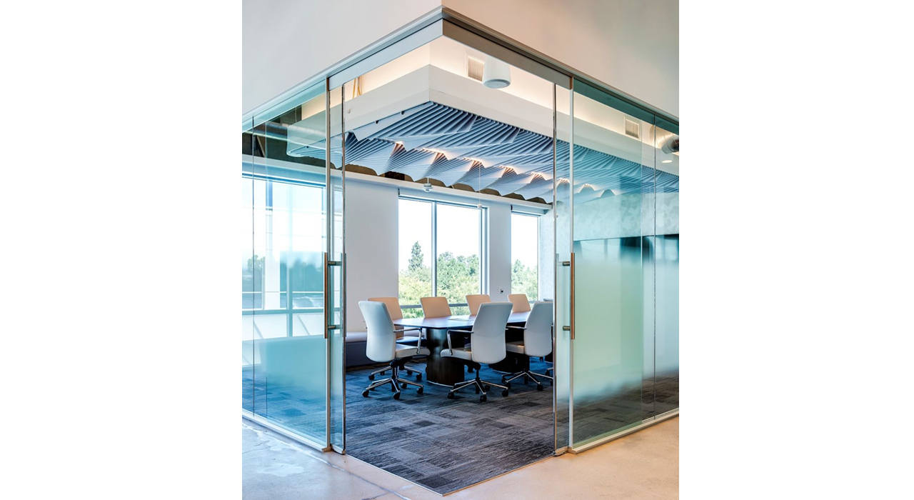acoustic drop ceiling tiles above conference room table