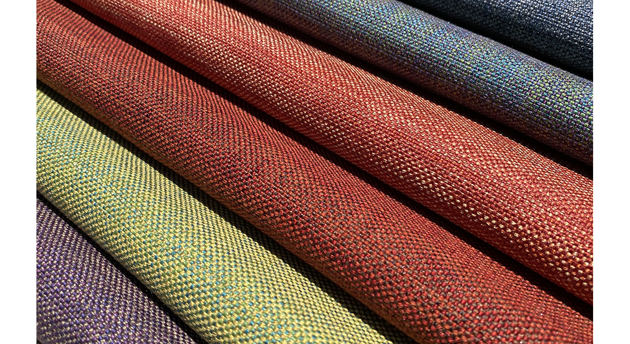 multi-colored upholstery textile collection folded up stacked together