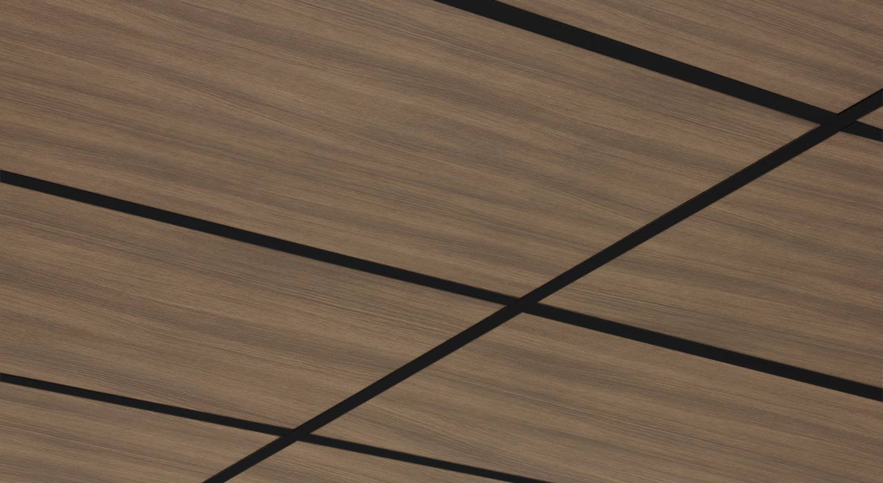 detail of ceiling tiles with a wood grain print finish in a black grid