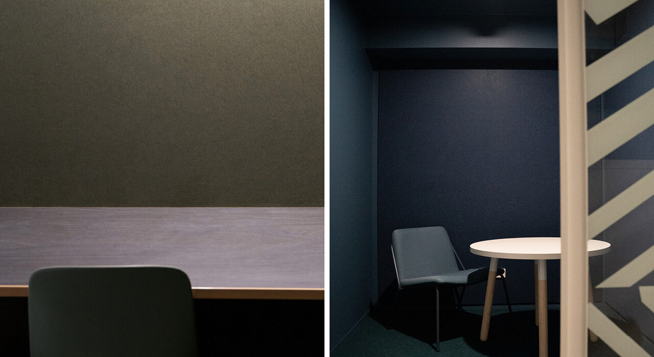 dark green and dark blue acoustic panels on office walls