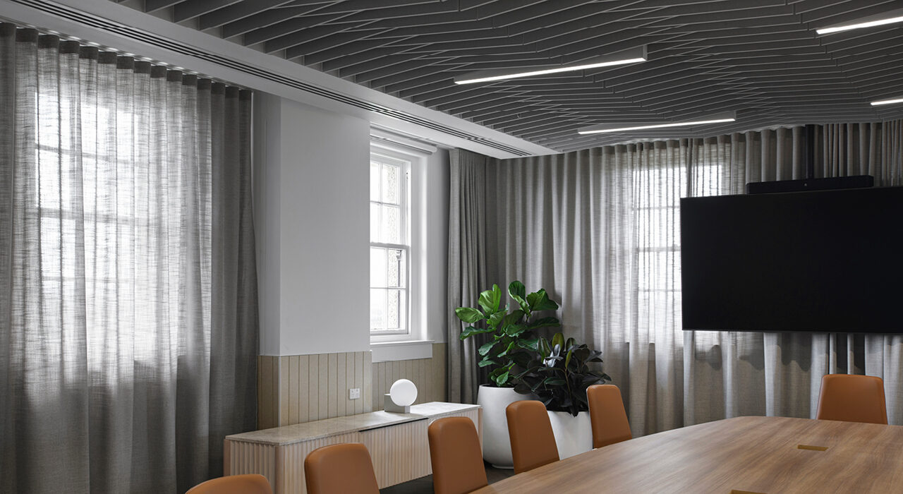 acoustic ceiling tile in conference area with lighting