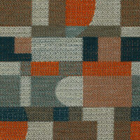 detail of upholstery textile with orange and tan geometric pattern