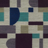 detail of upholstery textile with purple and teal geometric pattern