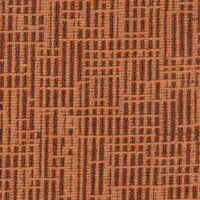 detail of orange upholstery textile with dark orange dot pattern