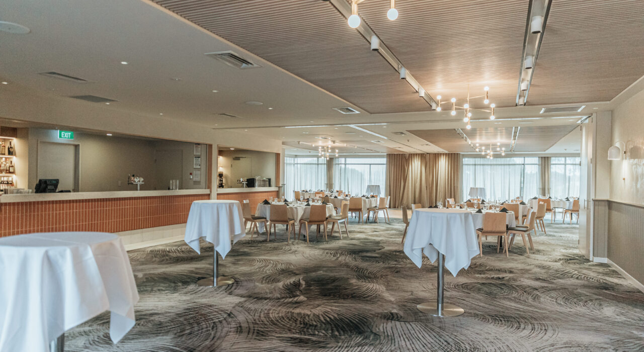 sound absorbing wood slatted panels installed above dining area