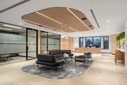 wooden drop ceiling tiles above seating area in office