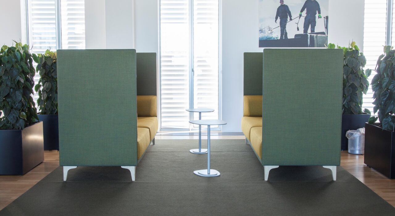rectangular acoustic Fraster Felt Rug under meeting space in workplace