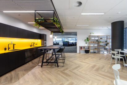 drop-in acoustic Sculpt ceiling tiles over open office area
