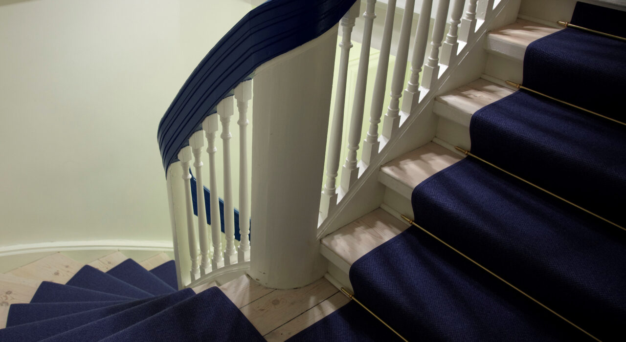 acoustic dark blue wool felt rug on staircase