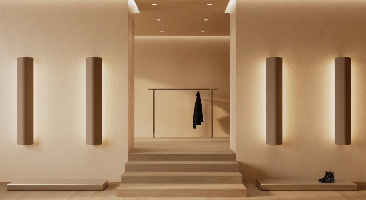 several vertically orientated acoustic light sconces on museum wall